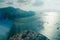 Aerial view of the Hong Kong bay with many ships and tankers with dramatic and moody sunlight