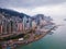 Aerial view of Hong Kong Downtown and Victoria Harbour. Financial district and business centers in smart city in Asia. Skyscraper