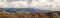 Aerial view of Honolulu, ocean, and foggy mountains from the summit of Diamond Head crater