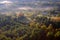 An aerial view of a hot air balloon floating over the Vermont country side