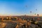 Aerial view of hot air balloons flying all over Cappadocia during the sunrise, Turkey