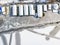 Aerial view of houseboats in frozen creek with snow on the roofs.