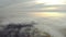 Aerial view at the houses that are covered with morning fog. Flight over the city of Lviv in Ukraine. Fabulous morning