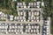 Aerial view of a Housing Estate village landscape by drone.residential roofs architecture decoration.Urban aerial houses building