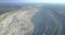 Aerial view huge asbestos pit terrain among vast landscape