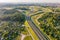 Aerial view of huge road junction of freeway with heavy traffic at city