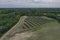 Aerial view of the huge solar power plant. Alternative clean green energy using renewable solar energy.