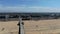 Aerial view of Huntington Pier, beach and coastline during sunny summer day