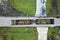 Aerial view of Hurricane Ian special aftermath recovery dump truck picking up vegetation debris from Florida suburban