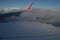 Aerial View of Iceland Coastline with Wing and Road seen from Plane in Flight