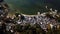 Aerial view of an iconic Hiroshima torii gate and Itsukushima shrine in Miyajima