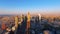 Aerial view of the iconic Sheikh Zayed road Skyscrapers and landmarks -Dubai city roads and Towers at sunset - Gevora Hotel view