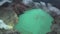 Aerial view of Ijen volcano with beautiful acid lake and sulfur gas going from crater