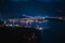 Aerial view of illuminated coastal Budva cityscape in Montenegro at night