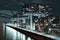 Aerial view of illuminated crane houses by the canal at the Zollhafen in Cologne, Germany at night