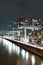 Aerial view of illuminated crane houses by the canal at the Zollhafen in Cologne, Germany at night