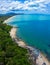 Aerial view image of sea, beache and jungle with blue  sky in Nakhon Si Thammarat, Thailand