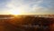 Aerial view of industrial city at sunset in autumn