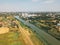 Aerial view of industrial cityscape with factory buildings, drone pov