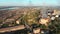 Aerial view of the Industrial Plant with Smoking Pipes near the City. Industrial zone