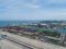 Aerial view of industrial port with containers, Large container vessel unloaded in Port.