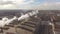 Aerial view of industrial steel plant. Aerial sleel factory. Flying over smoke steel plant pipes