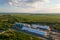 Aerial view of industrial ventilated silos for long term storage of grain and oilseed. Metal elevator for wheat drying