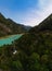 Aerial view Inguri reservoir lake in Upper Svaneti region, Georgia. Summer day, Emerland water. The mountains are covered with
