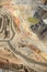 An aerial view inside an open pit copper mine.