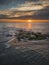 An aerial view of the Insua fort bathed in the sunset