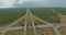 Aerial view Interstate I-10 freeway massive interchange road junction overpass in daytime with cloud blue sky near