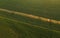 Aerial view of irrigation equipment watering green soybean crops