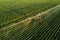 Aerial view of irrigation equipment watering green soybean crops