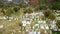 Aerial view of islamic grave cemetery. Ancient Muslim graveyard with monuments. Muslim cemetery. White tombstones and grave headst