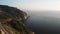 Aerial view of island cliffside landscape,ocean and rocky coast on summer day