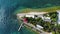 Aerial view of and island surrounded by the serene turquoise sea