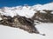 Aerial view of an island tip on a frozen lake with snow covering the frozen lake