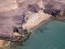 Aerial view of the jagged shores and beaches of Lanzarote, Spain, Canary. Roads and dirt paths. Papagayo