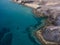 Aerial view of the jagged shores and beaches of Lanzarote, Spain, Canary. Roads and dirt paths. Papagayo