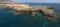 Aerial view of the jagged shores and beaches of Lanzarote, Spain, Canary. Roads and dirt paths. Papagayo beach