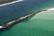 Aerial view of jetty along the coastline of Panama City, Florida