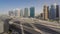 Aerial view of Jumeirah lakes towers skyscrapers with traffic on sheikh zayed road.