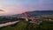 Aerial view of the Kalikuto Bridge, an Iconic Red Bridge at Trans Java Toll Road, Batang when sunrise. Central Java, Indonesia,