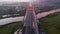 Aerial view of the Kalikuto Bridge, an Iconic Red Bridge at Trans Java Toll Road, Batang when sunrise. Central Java, Indonesia,