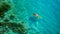 Aerial view of a kayak in the blue sea .Woman kayaking She does water sports activities