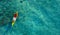 Aerial view of a kayak in the blue sea .Woman kayaking She does water sports activities