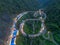 Aerial view of Kelok 9 bridge at dusk. A popular bridge in Sumatra to commute between cities