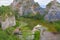 Aerial view of Khao Ngu Stone. National park with river lake, mountain valley hills, and tropical green forest trees at sunset in