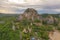 Aerial view of Khao Ngu Stone. National park with river lake, mountain valley hills, and tropical green forest trees at sunset in