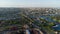 Aerial view of the Kherson city. A shipyard on the banks of the Dnieper River of which there are cranes and ships.